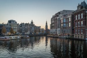 View of various buildings in Amsterdam, the Netherlands from the Amstel river