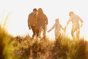 family walking in field