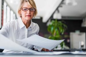 woman reviewing employer burden quotes