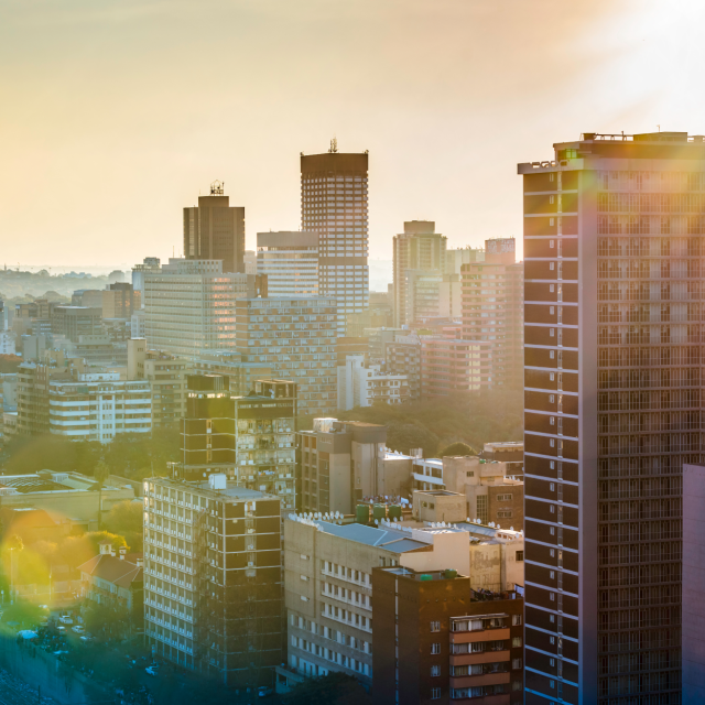 sun shining over city