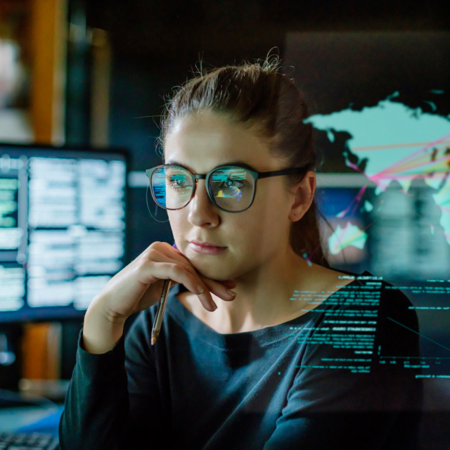 woman looking at computer