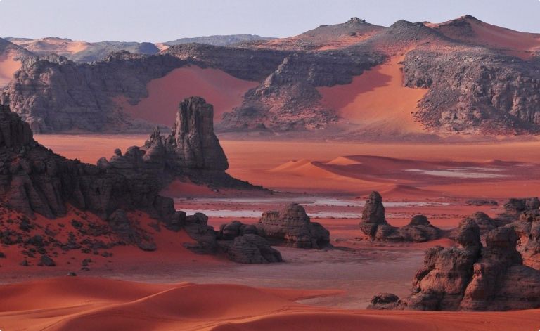 rocky hills with red sand