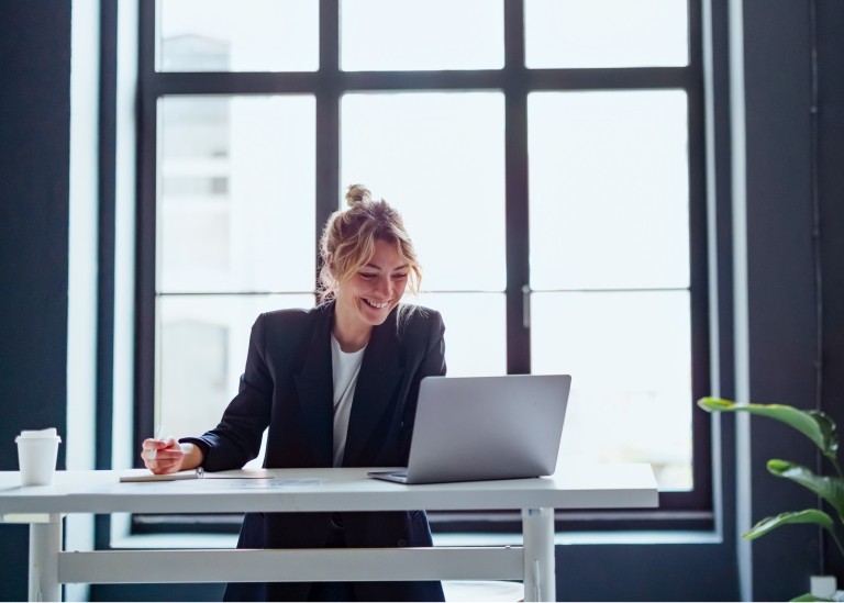 Female HR leader virtually onboarding a new hire from her laptop