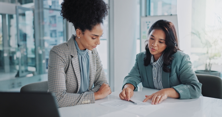 Coworkers discuss expanding into the East African Community (EAC)