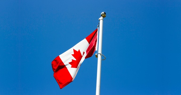 Canadian flag on a flag pole