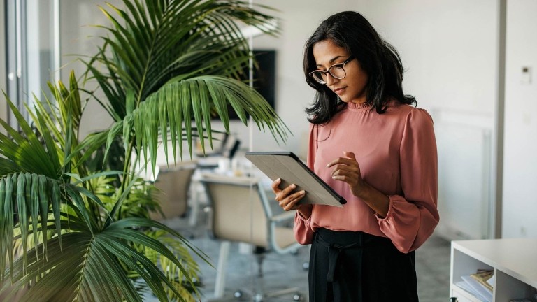 Woman looking at tablet