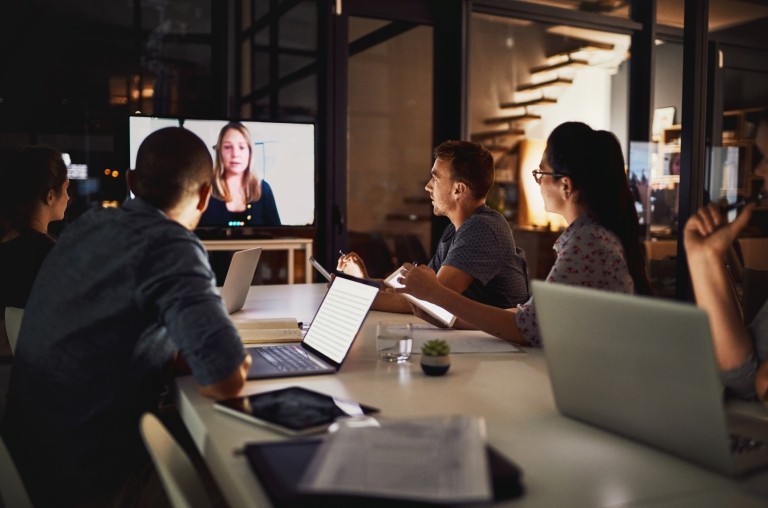 Recruiters virtually interviewing a candidate to join their international staff