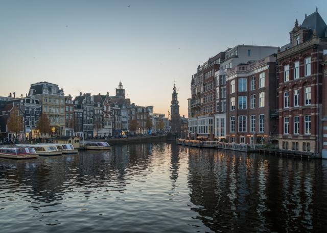 View of various buildings in Amsterdam, the Netherlands from the Amstel river