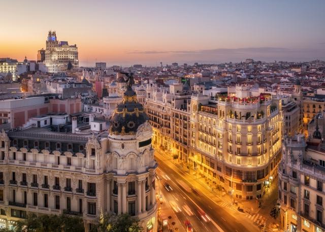 The Metropolis building in the Gran Via area of Madrid, Spain at sunset.